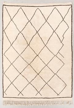 A Moroccan carpet approx 286x226 cm.