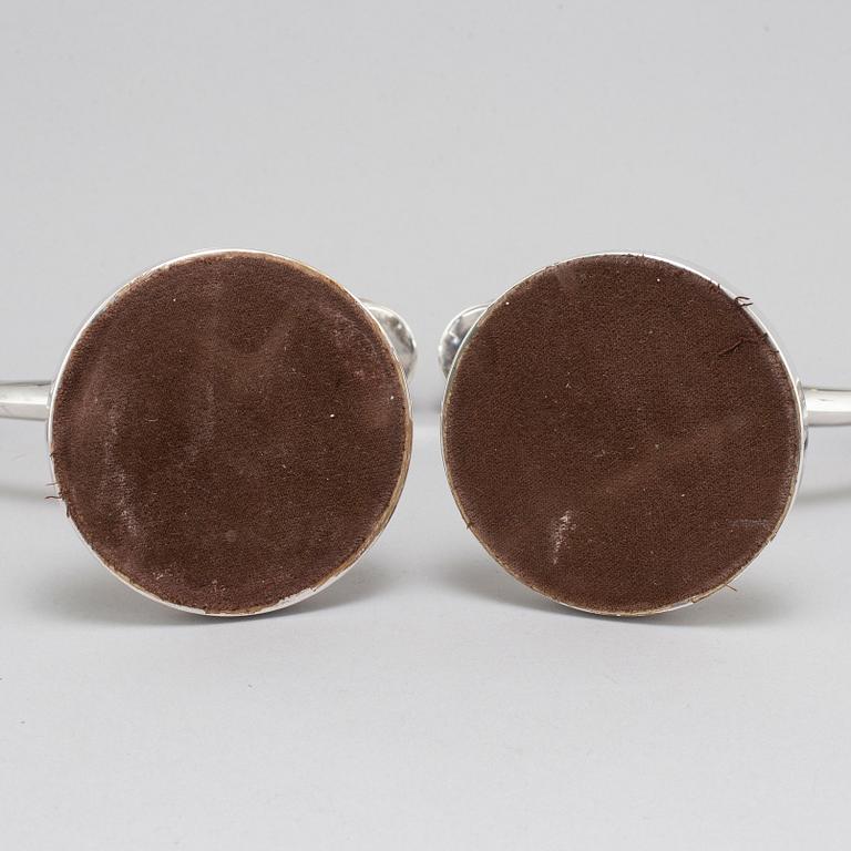 A pair of silver candelabra from MGAB, Uppsala, 1969-71.