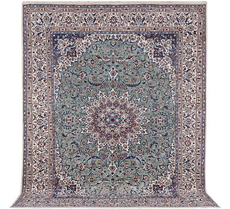 A carpet, Nain, part silk, 9 laa, circa 383 x 294 cm.