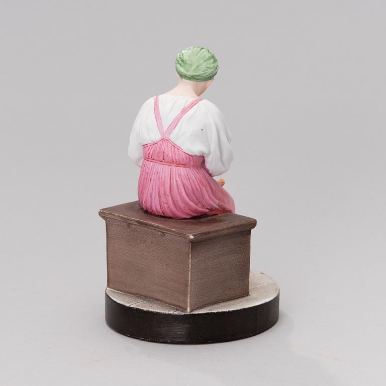 A RUSSIAN POPOV FIGURINE, porcelain, late 19th century.