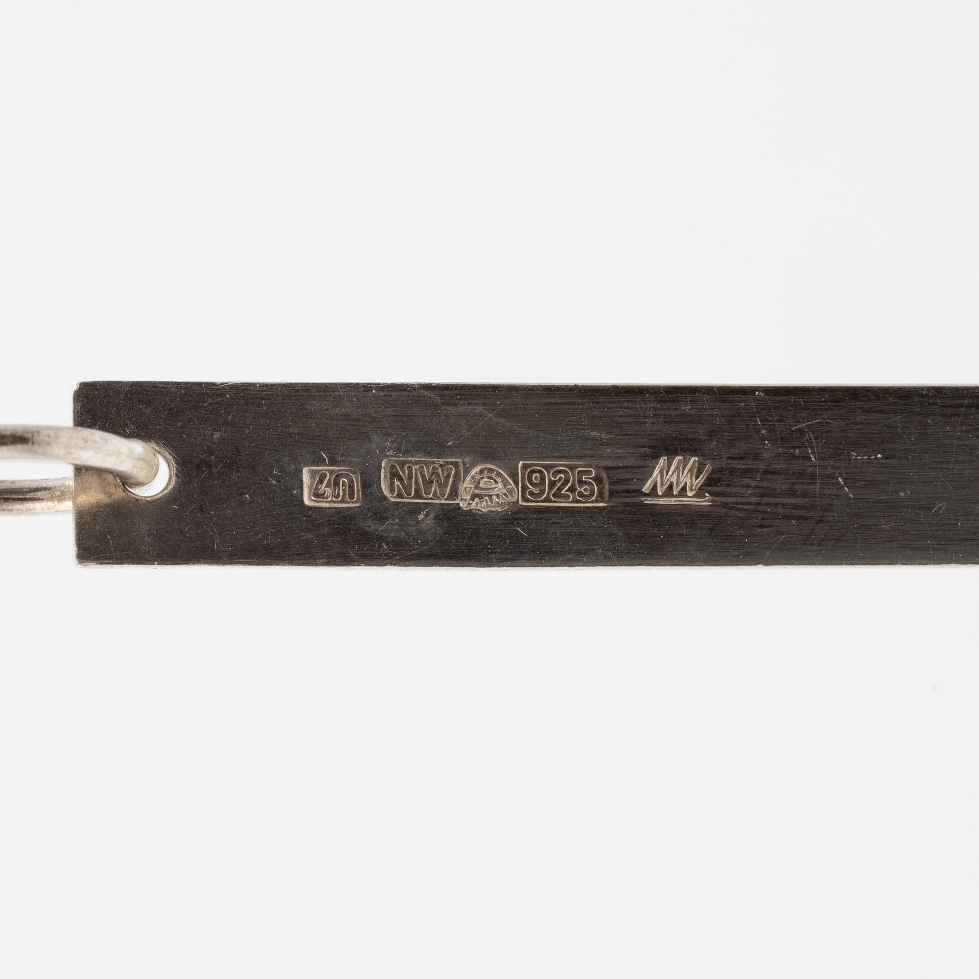 Tapio Wirkkala, Pendant "Crescent moon", sterling silver, NW Finland 1973.