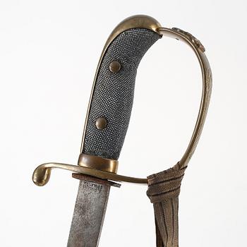 SABEL, polissabel med flottans märke, 1900-talets första hälft.