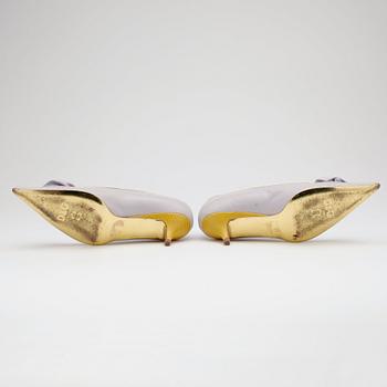 DOLCE & GABBANA, a pair of light purple leather pumps.