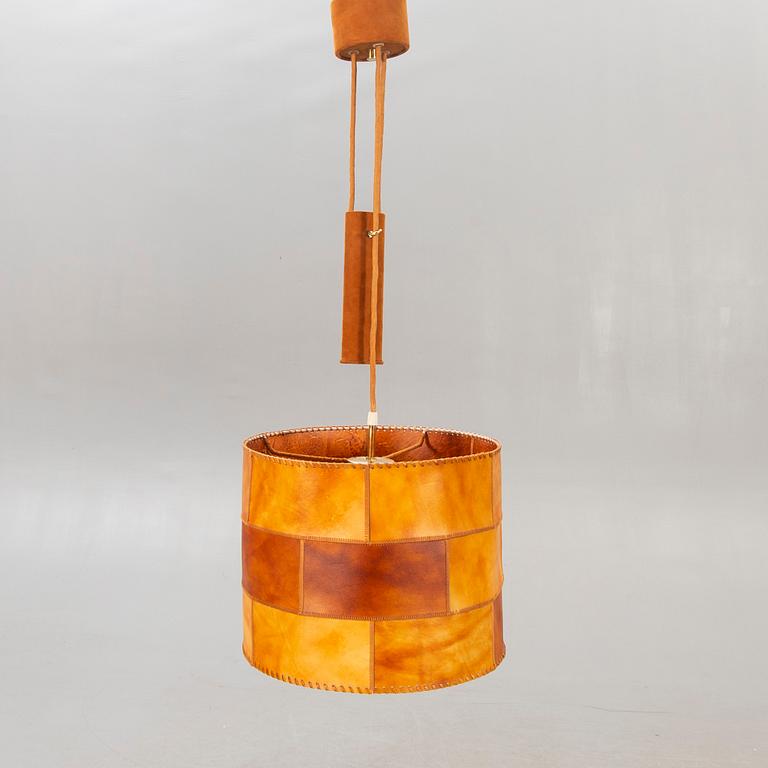 A leather ceiling pendant later part of the 20th century.