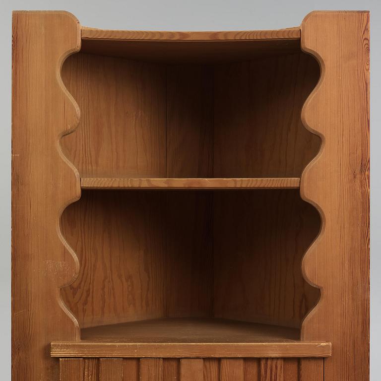 Axel Einar Hjorth, a stained pine "Utö" corner cabinet, Nordiska Kompaniet, Sweden, 1930s.
