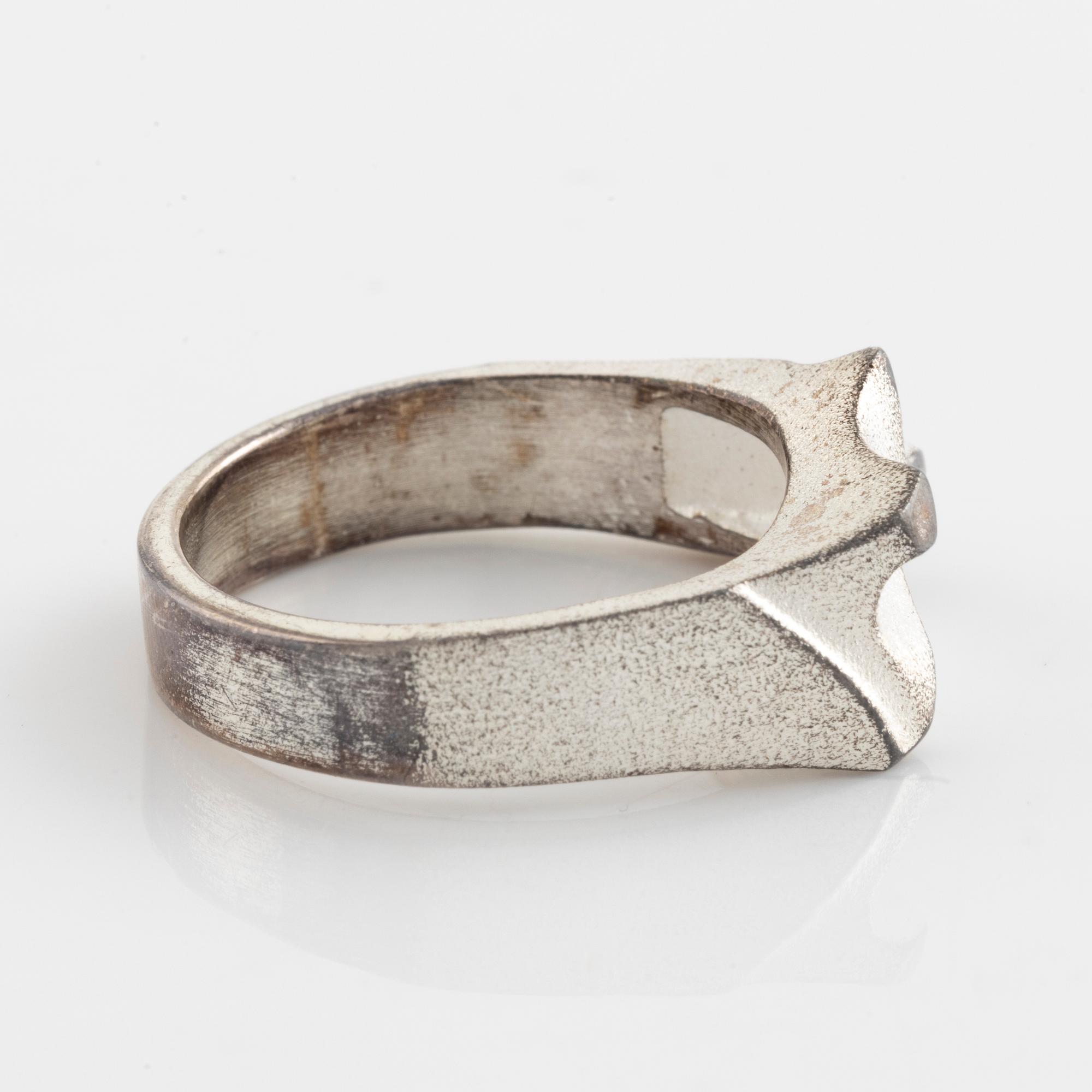 Lapponia, two sterling silver rings and tie ping.