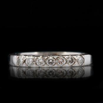 RING, 18 k vitguld med briljantslipade diamanter totalt ca 0,21 ct. Vikt ca 2,5 g.