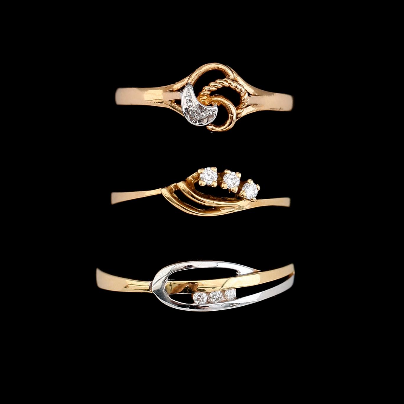 RINGAR, 3 st, 18 k guld med briljantslipade diamanter, 1900-talets andra hälft. Vikt ca 4 gram.