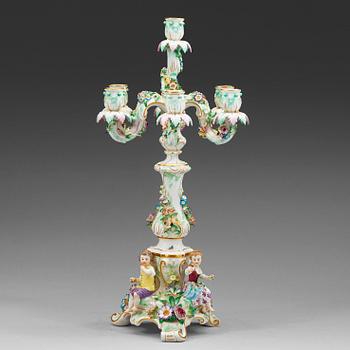 396. A flower-encrusted Meissen seven-light candelabra, end of 19th Century.