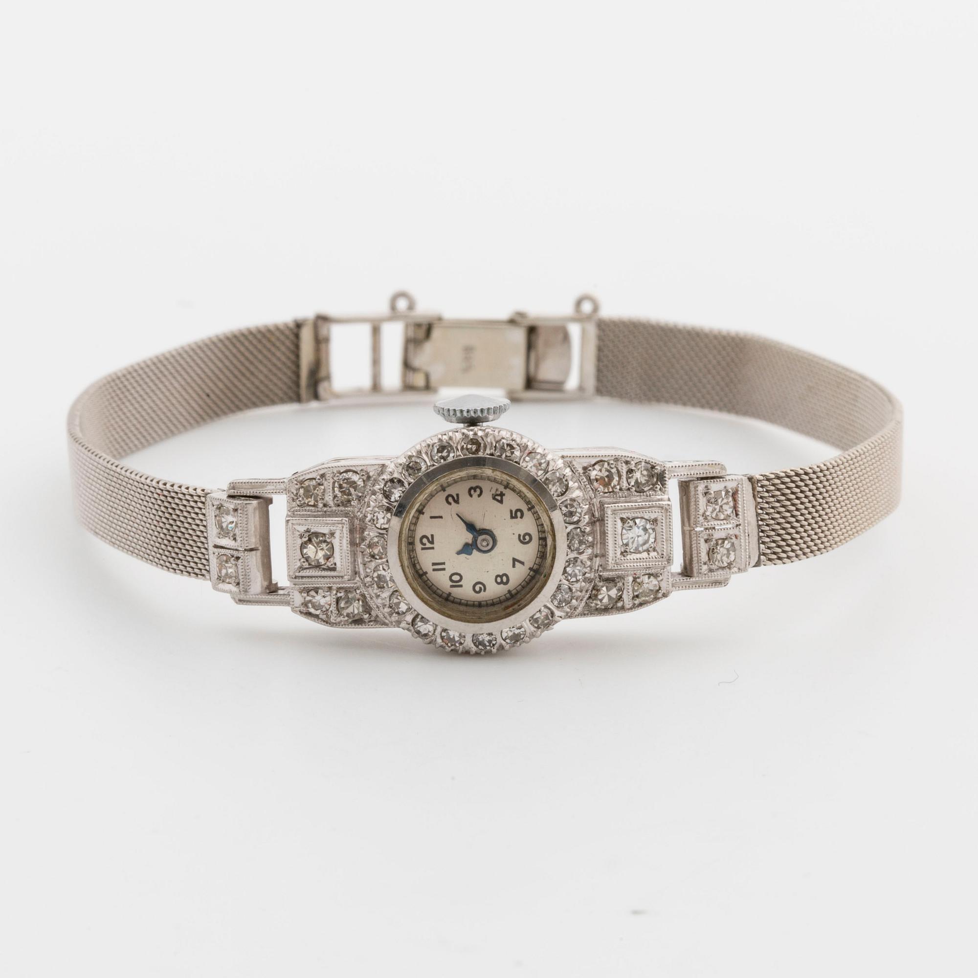 LADIE´S WATCH platinum diamonds 8/8 cut ca 0,30 ct, later wristband 14K whitegold.