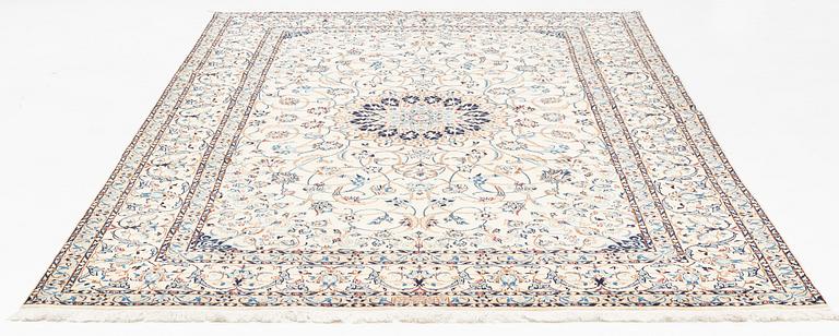 A carpet, Nain, part silk, fine 9 laa, signed, ca 327 x 210 cm.