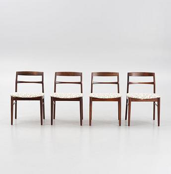 A Rosewood dining table and four chairs, Denmark. 1960-tal.