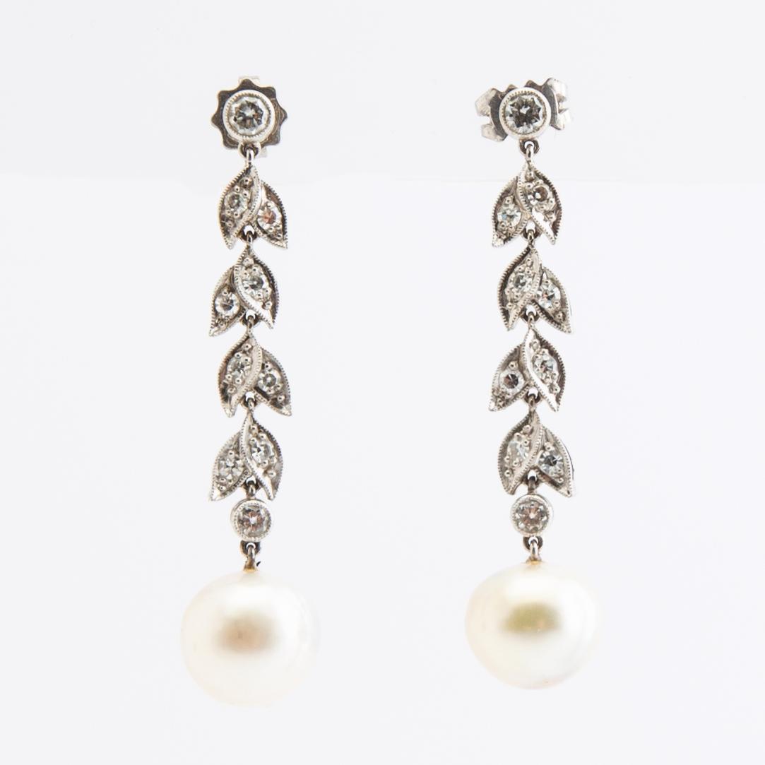 Earrings, a pair, 18k white gold with pearls and diamonds.