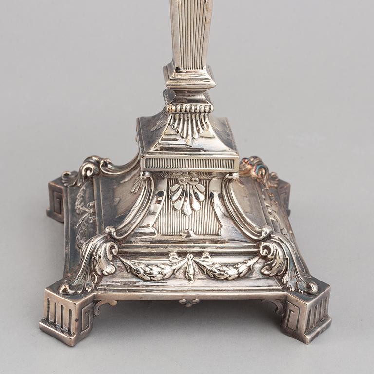 A pair of silver plated candelabras, early 20th century.