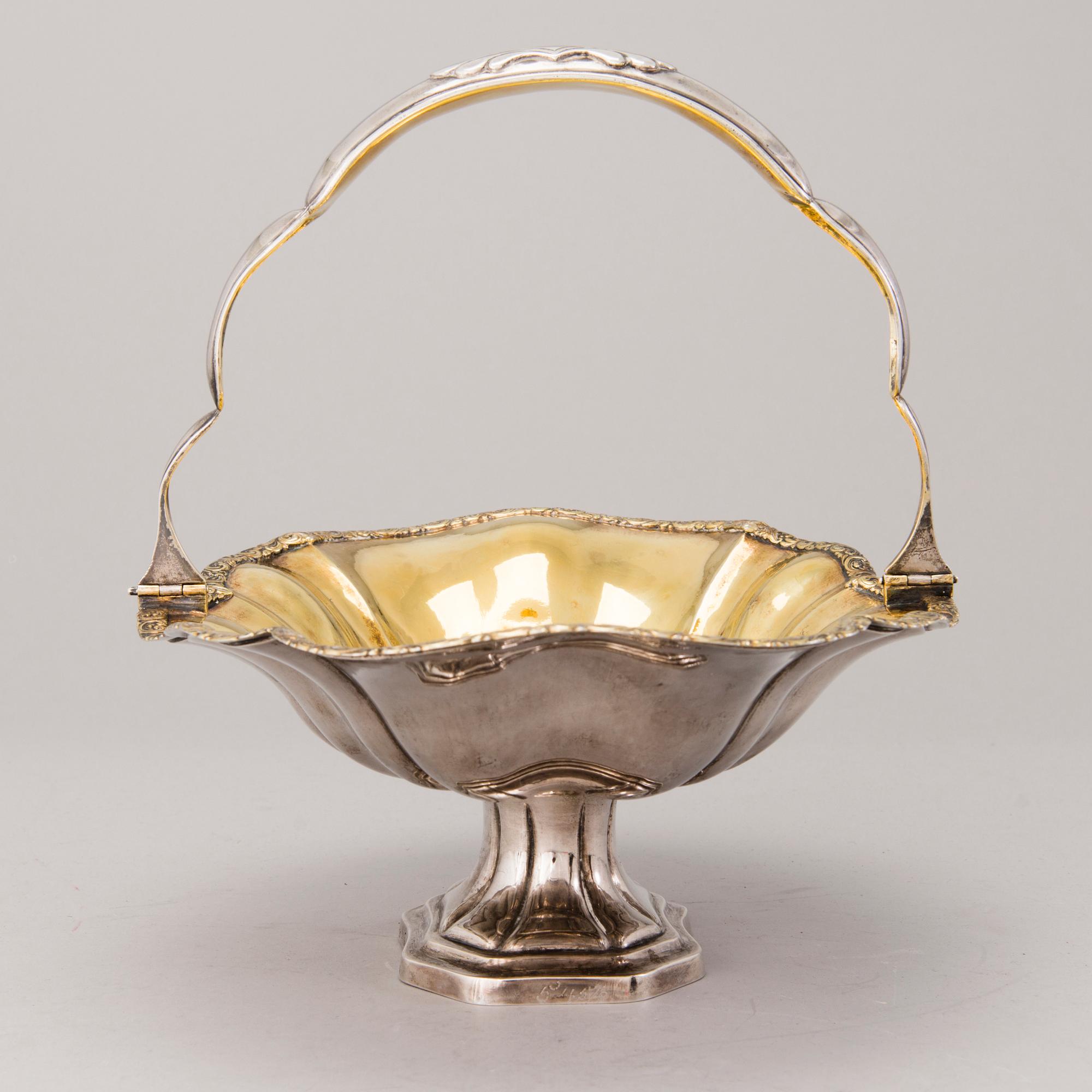 GOTTFRIED ERHARD DEHIO, A parcel-gilt footed silver bread basket, Reval / Tallinn 1829-42. Finnish control marks.
