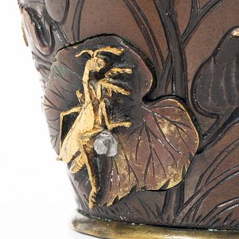 A pair of Japanese metal vases, Meiji (1868-1912).