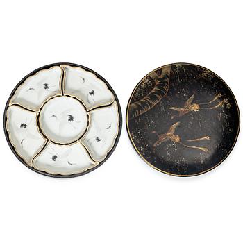 A Japanese lacquer box with a six-piece porcelain cabaret, Japan, early 20th century.