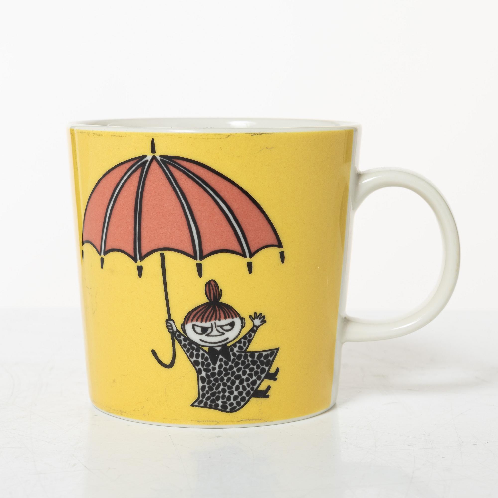 A set of 31 Moomin mugs, Arabia, Finland.