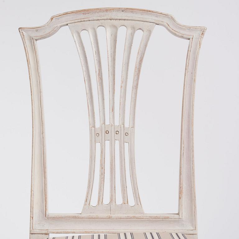 A set of twelve Gustavian chairs by J. Hammarström (master 1794-1812) and E. Ståhl (1794-1820).