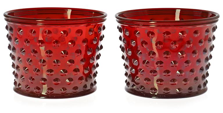 A pair of Josef Frank red glass pots by Svenskt Tenn.