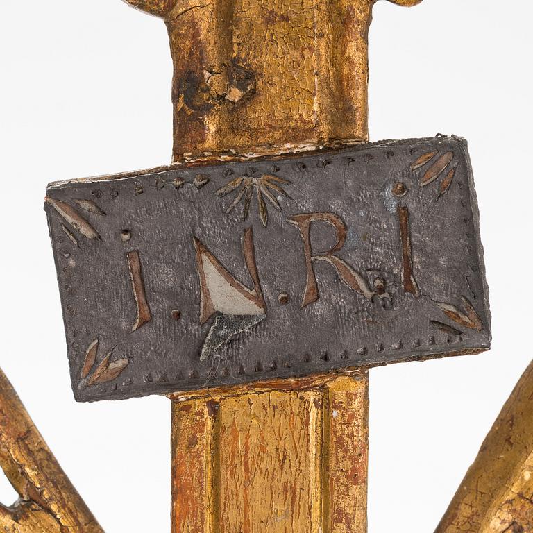 A 19th century gilded and painted wood crucifix.