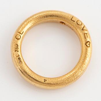 An 18K gold Ole Lynggaard ring set with a round brilliant-cut diamond.
