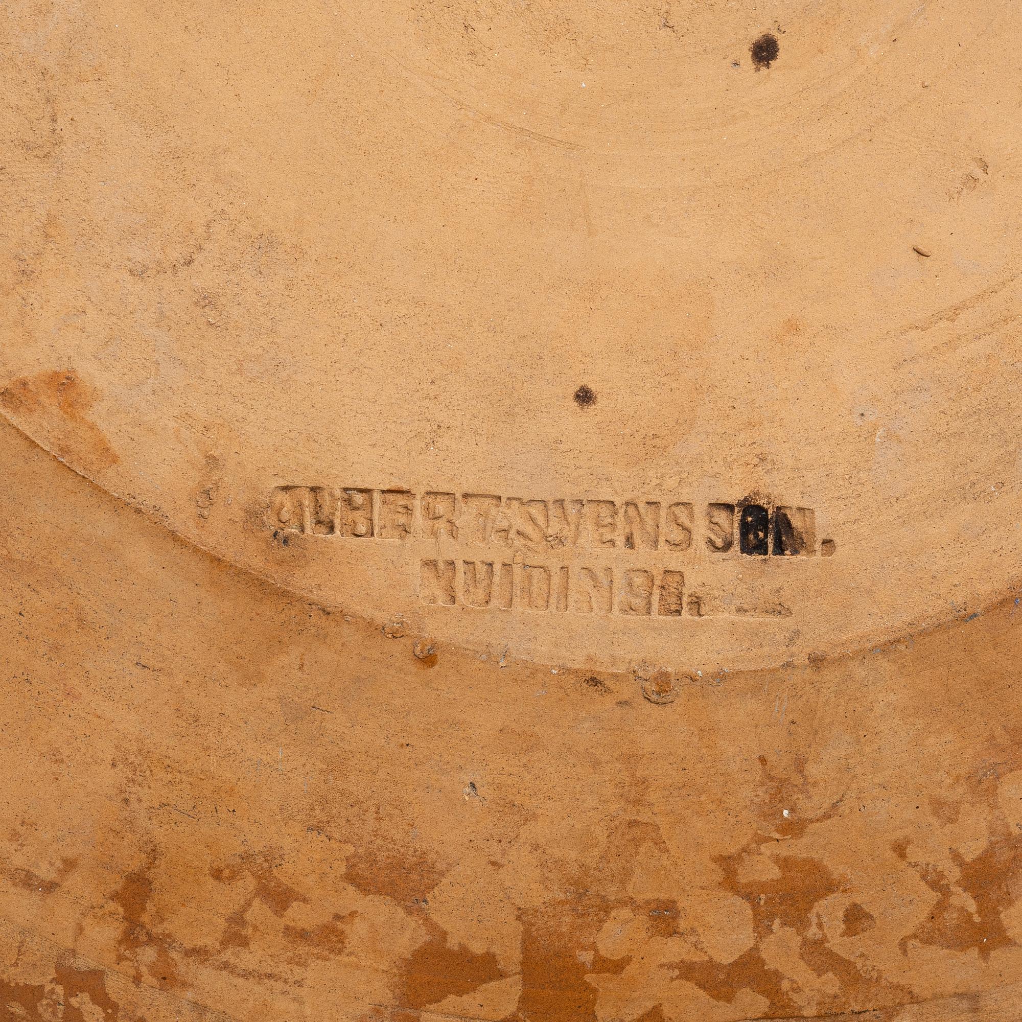 One eathenware bowl and two plates.