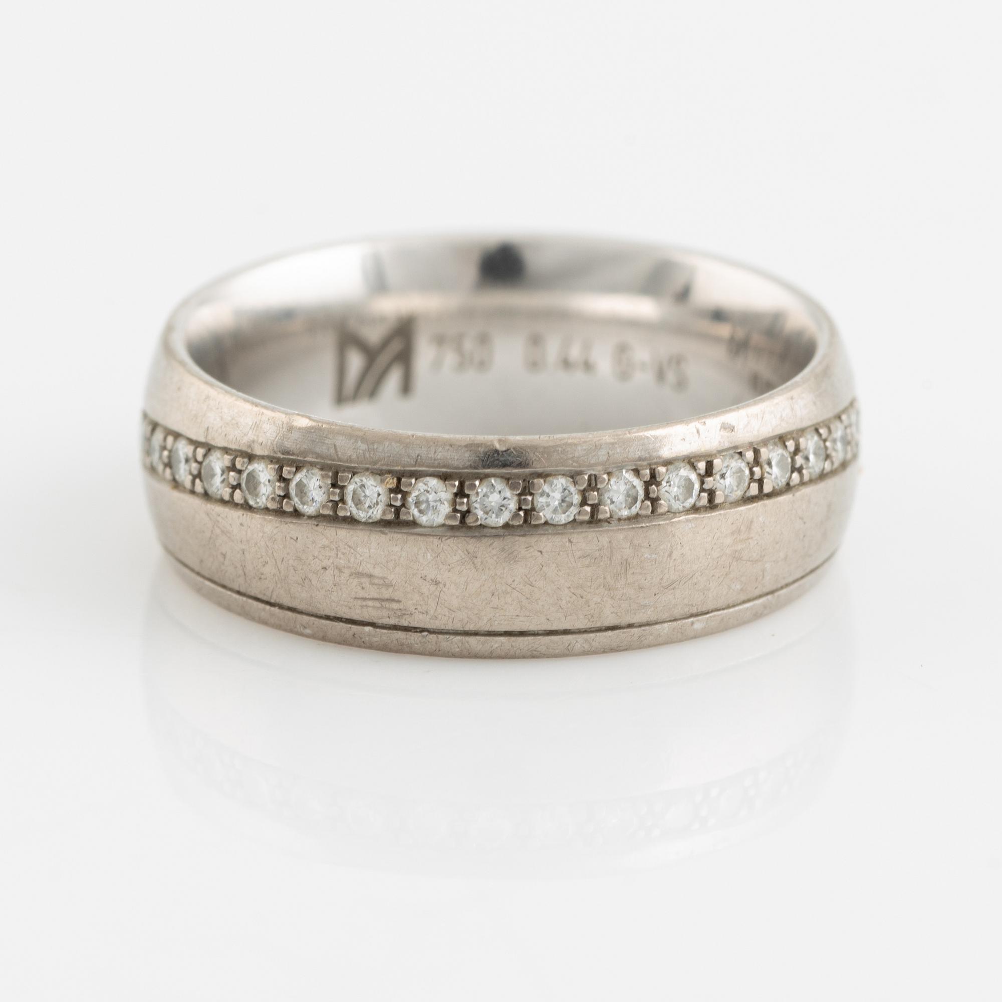 White gold and brilliant cut diamond ring.