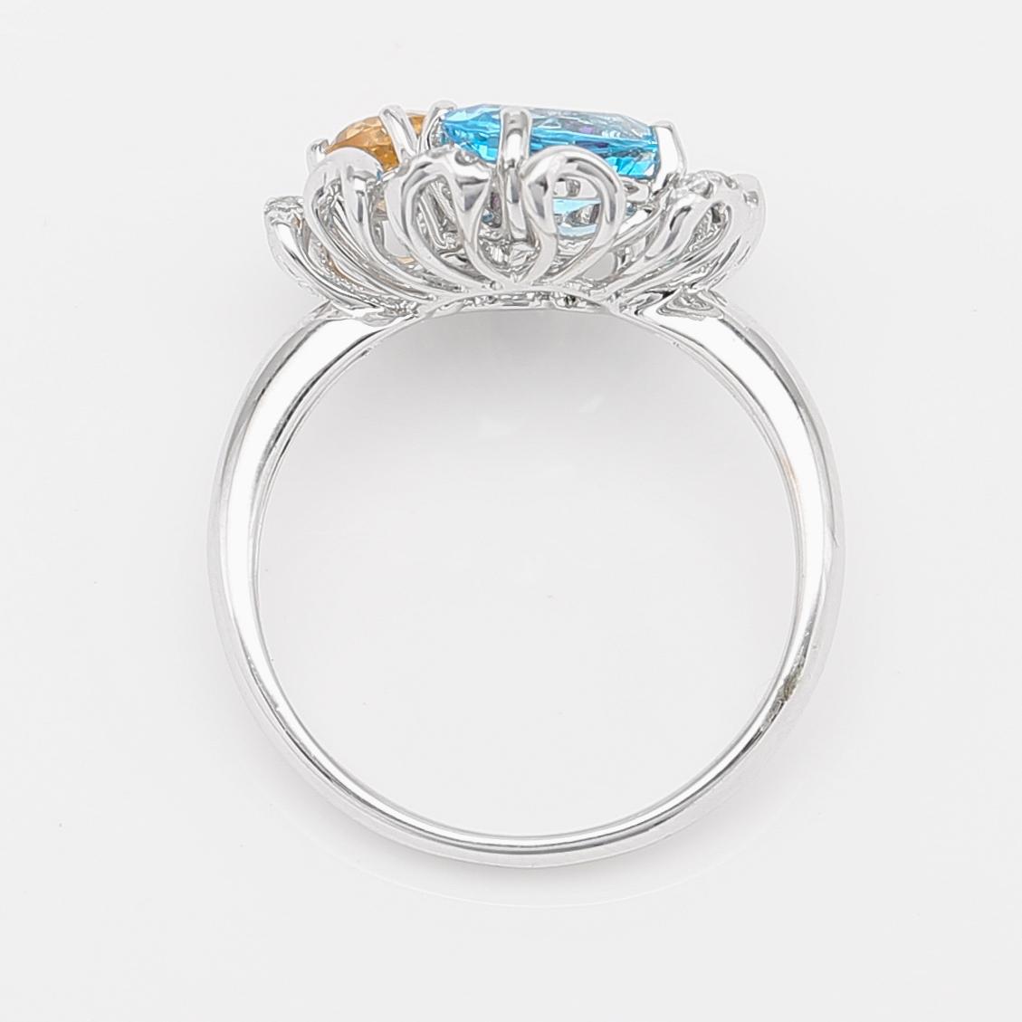 RING, 14K vitguld, blå topas, citrin och diamanter.