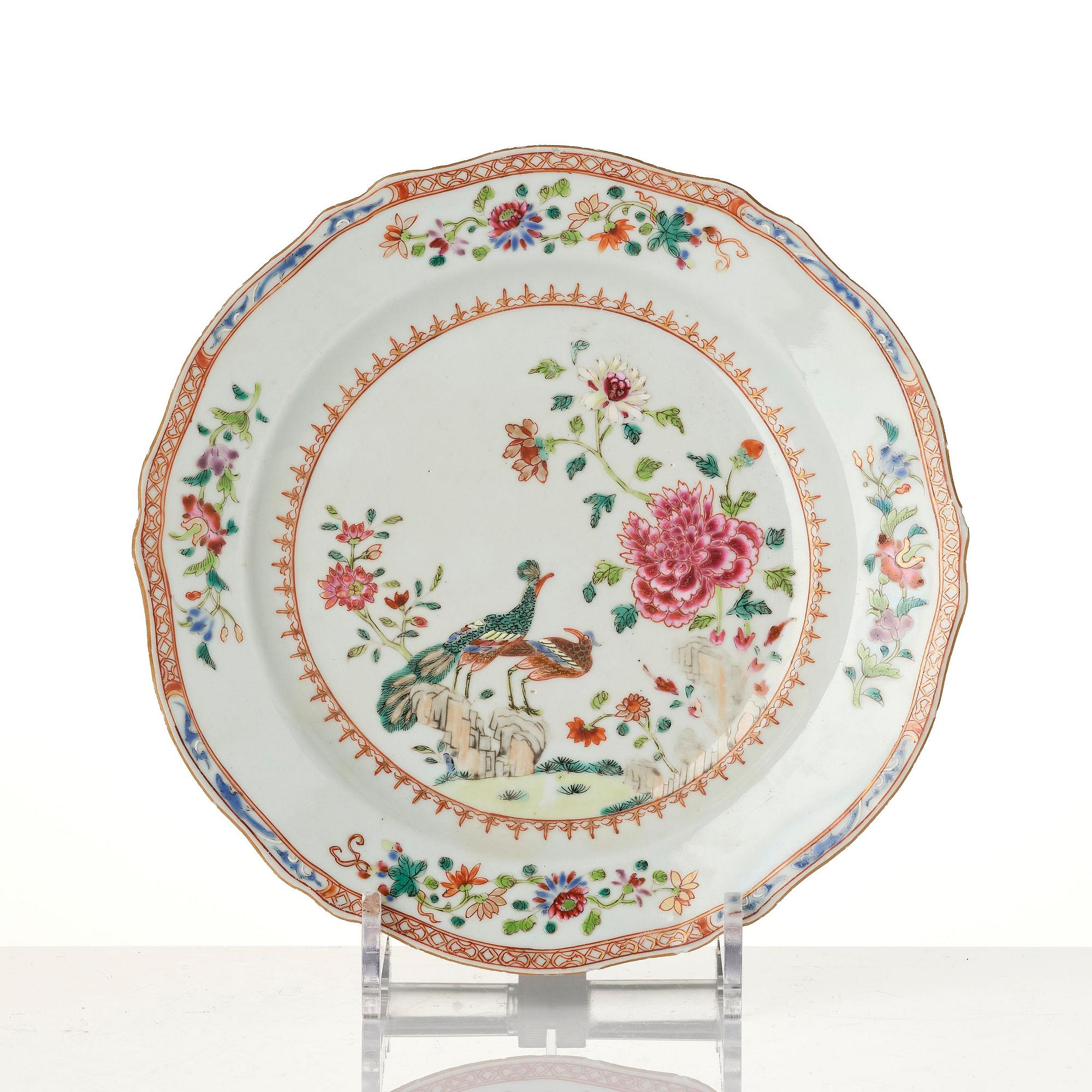 A group of famille rose 'double peacock' serving dishes, Qing dynasty, Qianlong (1736-95). (8 pieces).