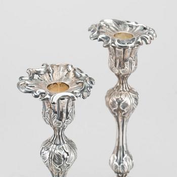 A pair of Gustav Möllenborg Feron candle holders, Stockholm, 1867. Filled foot.