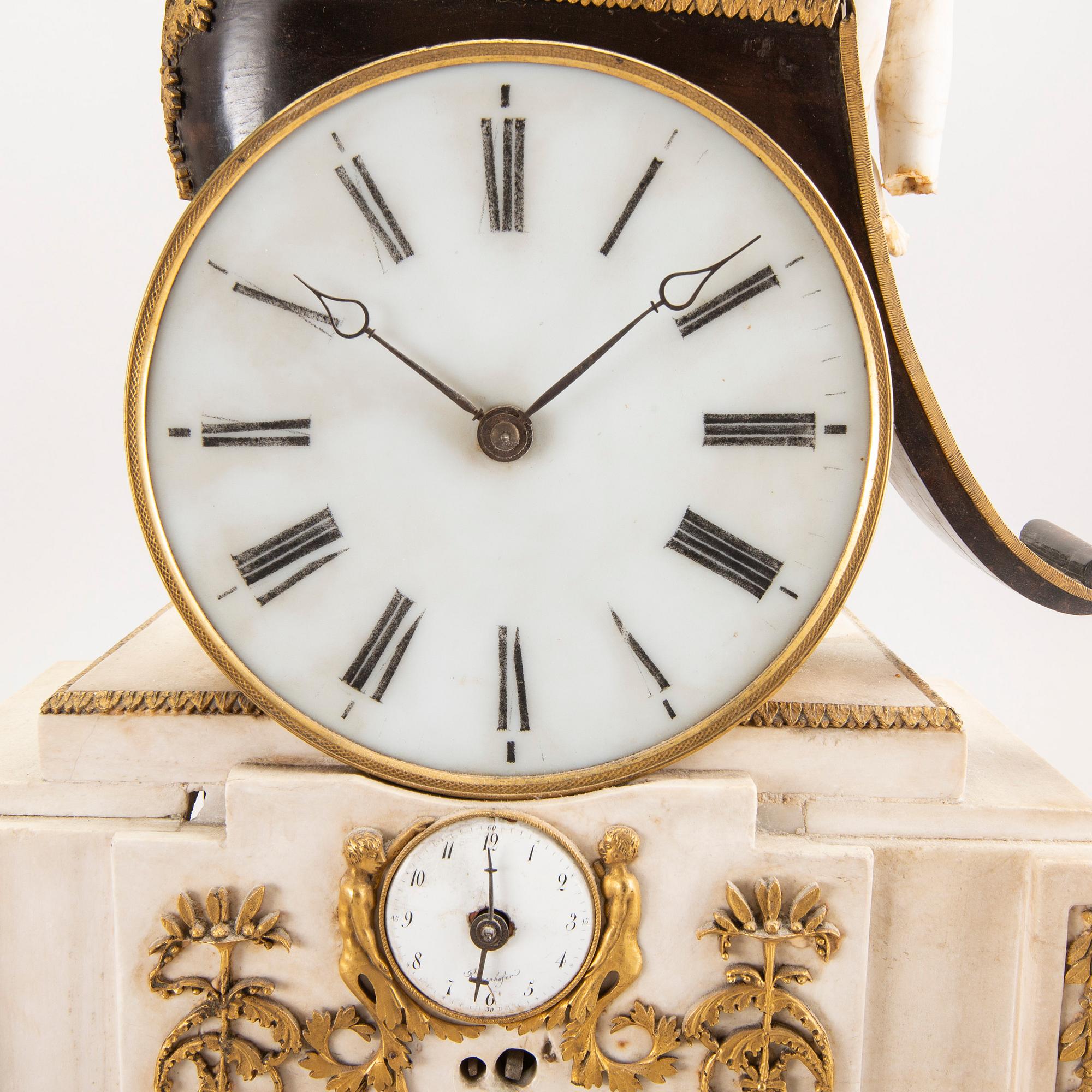 An Empire table clock first half of the 19th century.