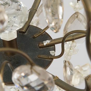 A rococo style chandelier, early 20th century.