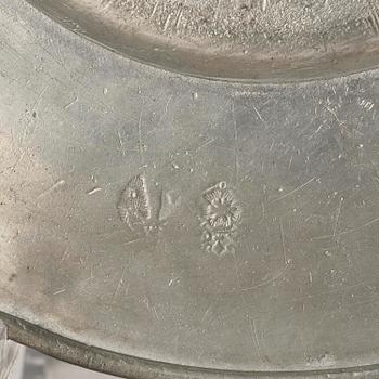 A pewter plate from Hedvig Eleonora's 'Wadstena' service, dated 1670.