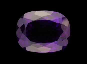 633. An unmounted amethyst.