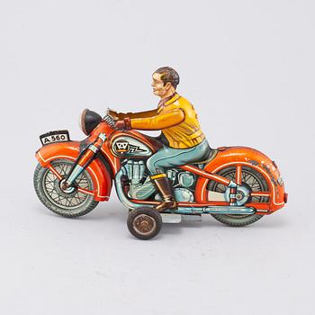 A mid 20th century "Arnold" tin toy.