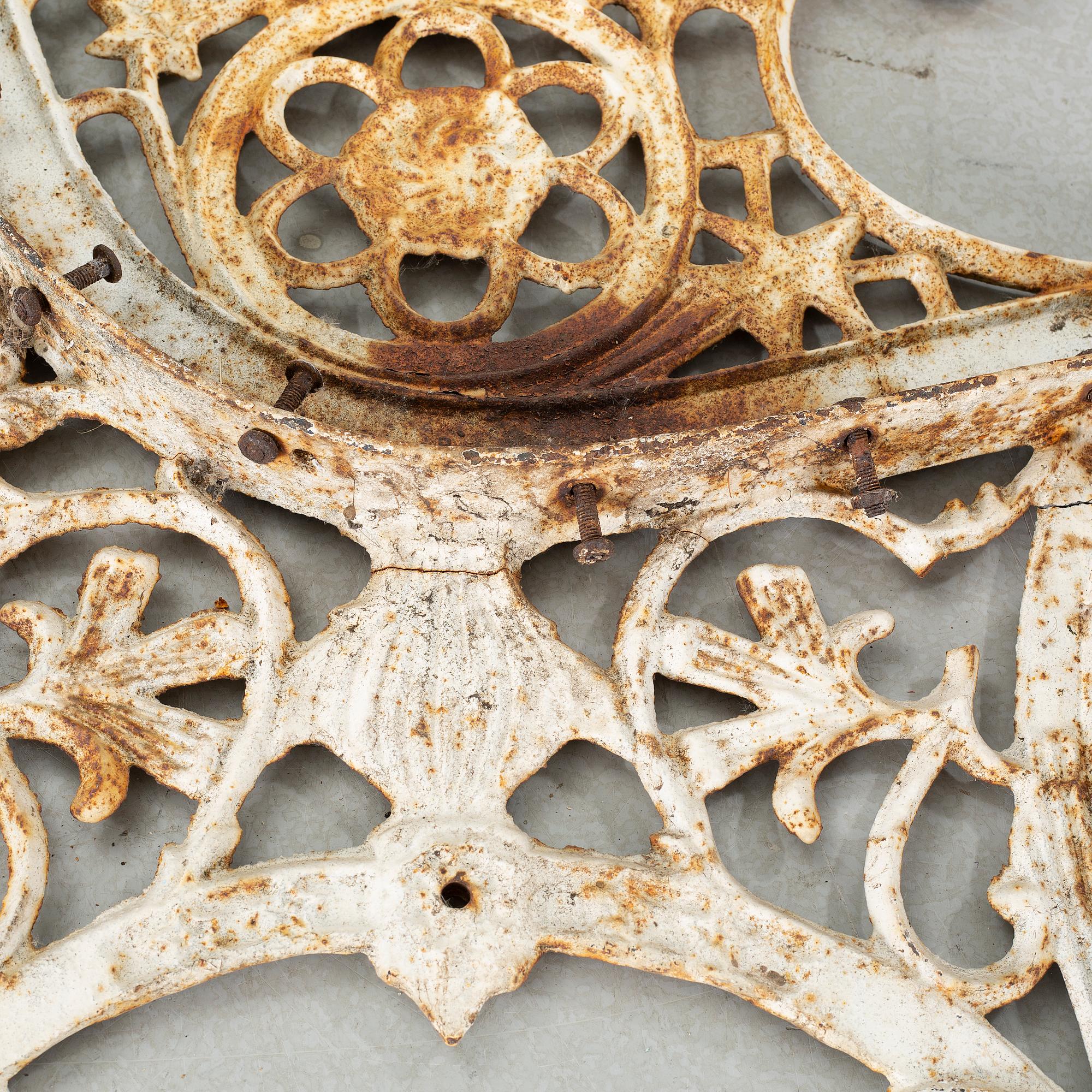 A pair of gables for a garden sofa, fist half of the 20th century.