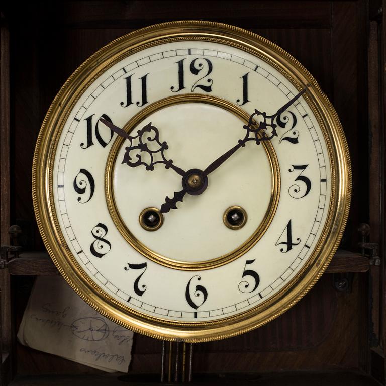 A circa 1900 Renaissance style wall clock.