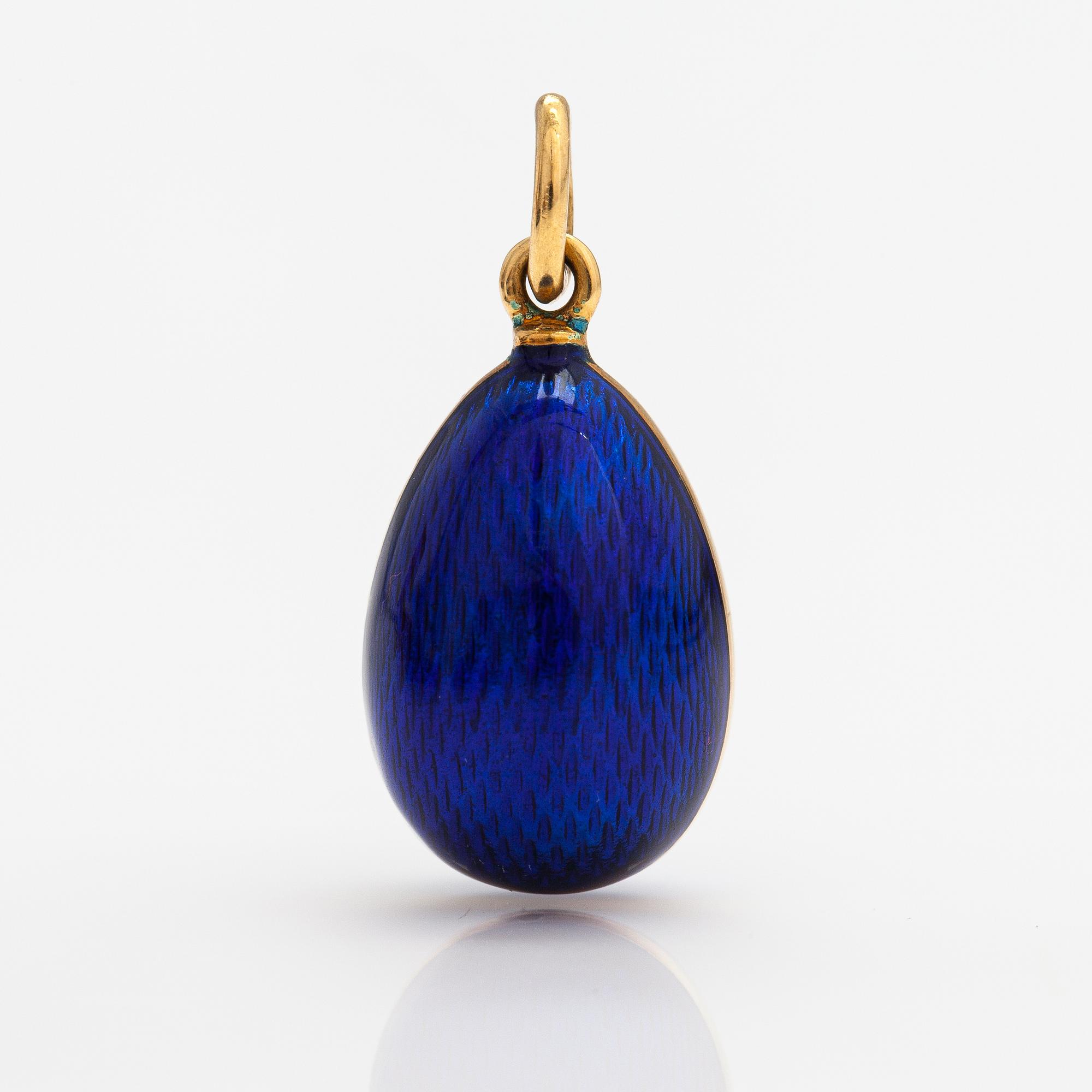 Fabergé, An 18K gold and enamel egg shaped pendant. Marked Fabergé, 573/1000. Victor Mayer.