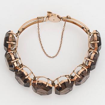 hexagonal shaped smoky quartz bracelet.