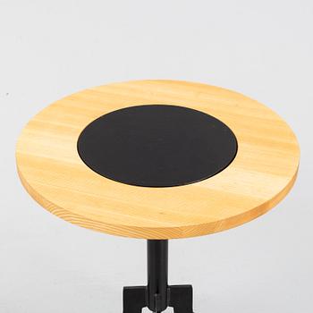 A 'Triptyk' table with an iron stand by Jonas Bohlin for Källemo, 1989.