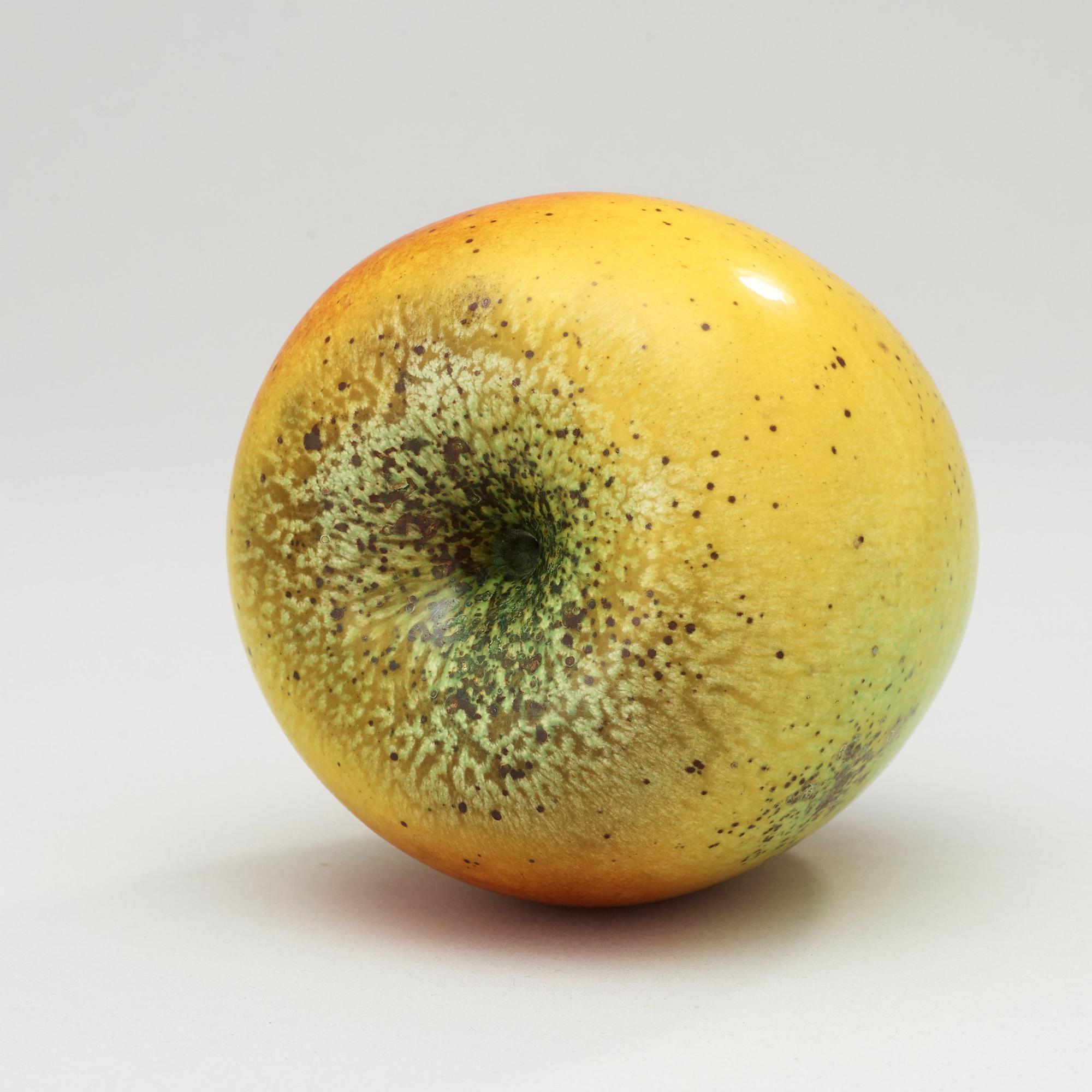 A Hans Hedberg faience apple, Biot, France.