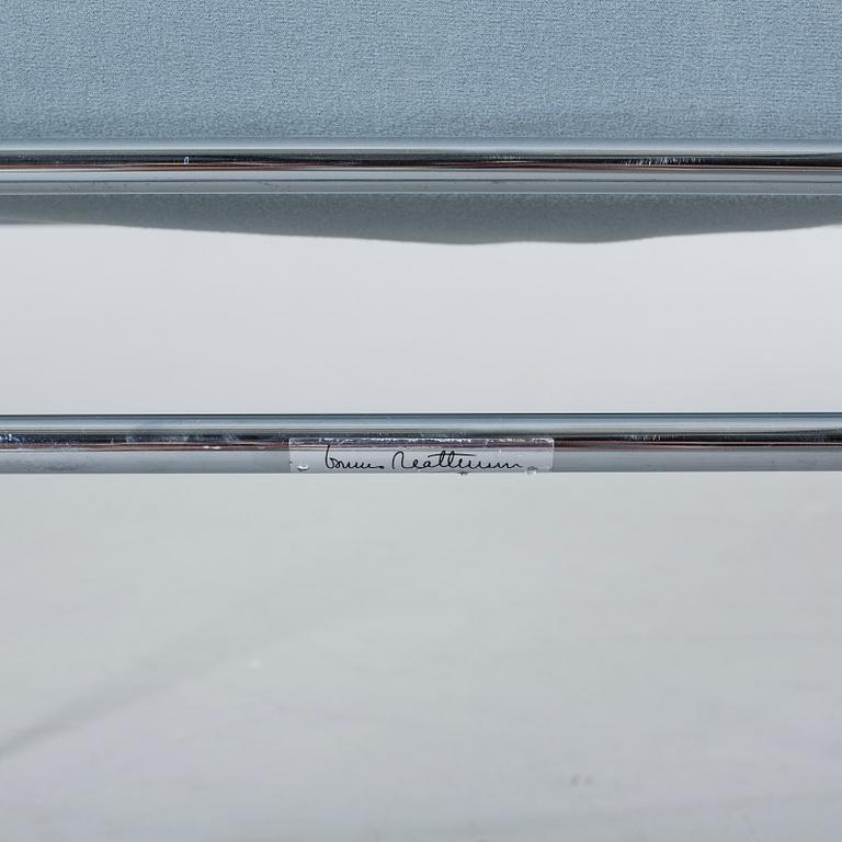 A COUPLE OF BRUNO MATHSSON ARMCHAIRS.