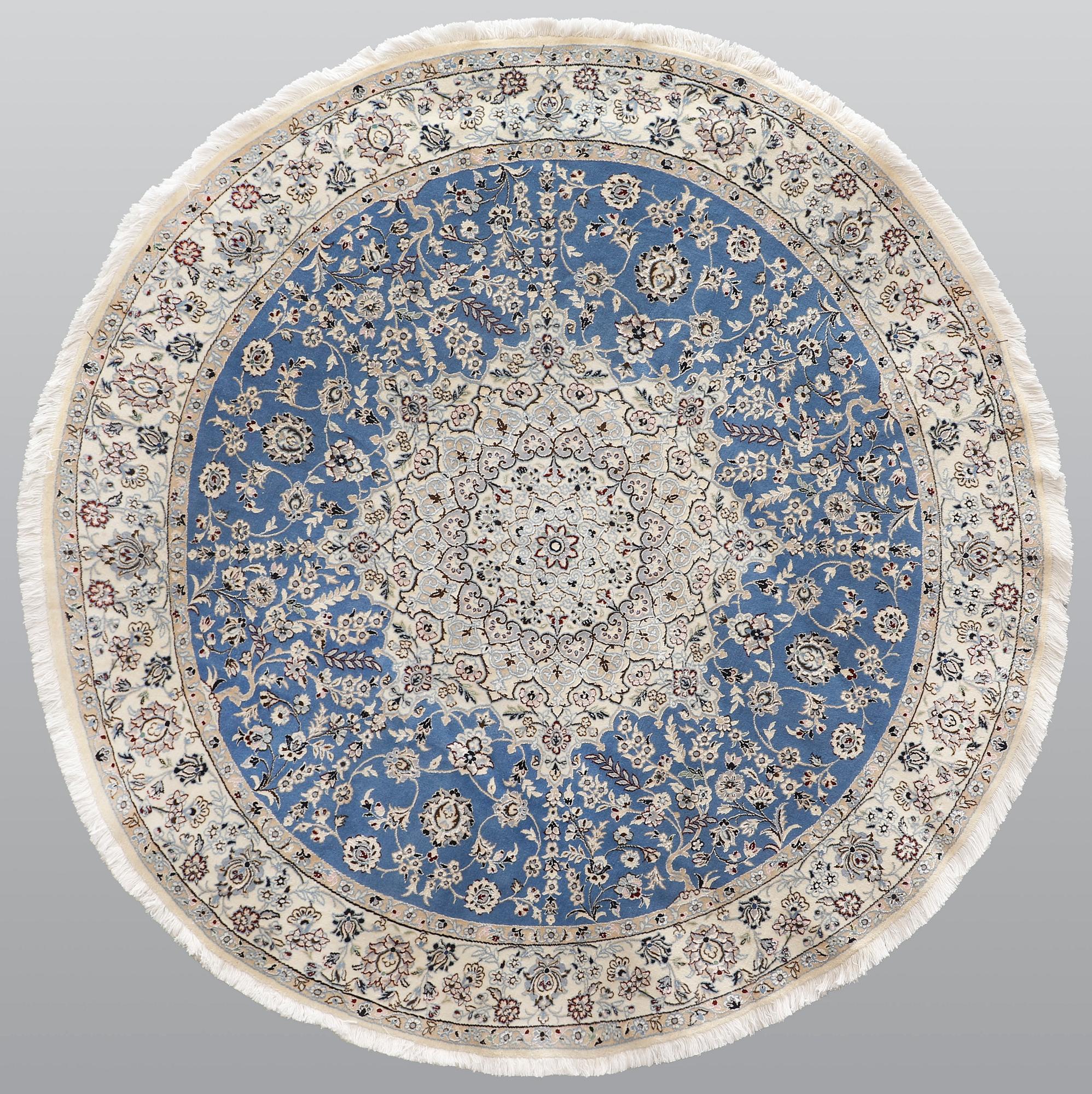 A round part silk Nain rug, so called 9 LAA, diameter 195 cm.