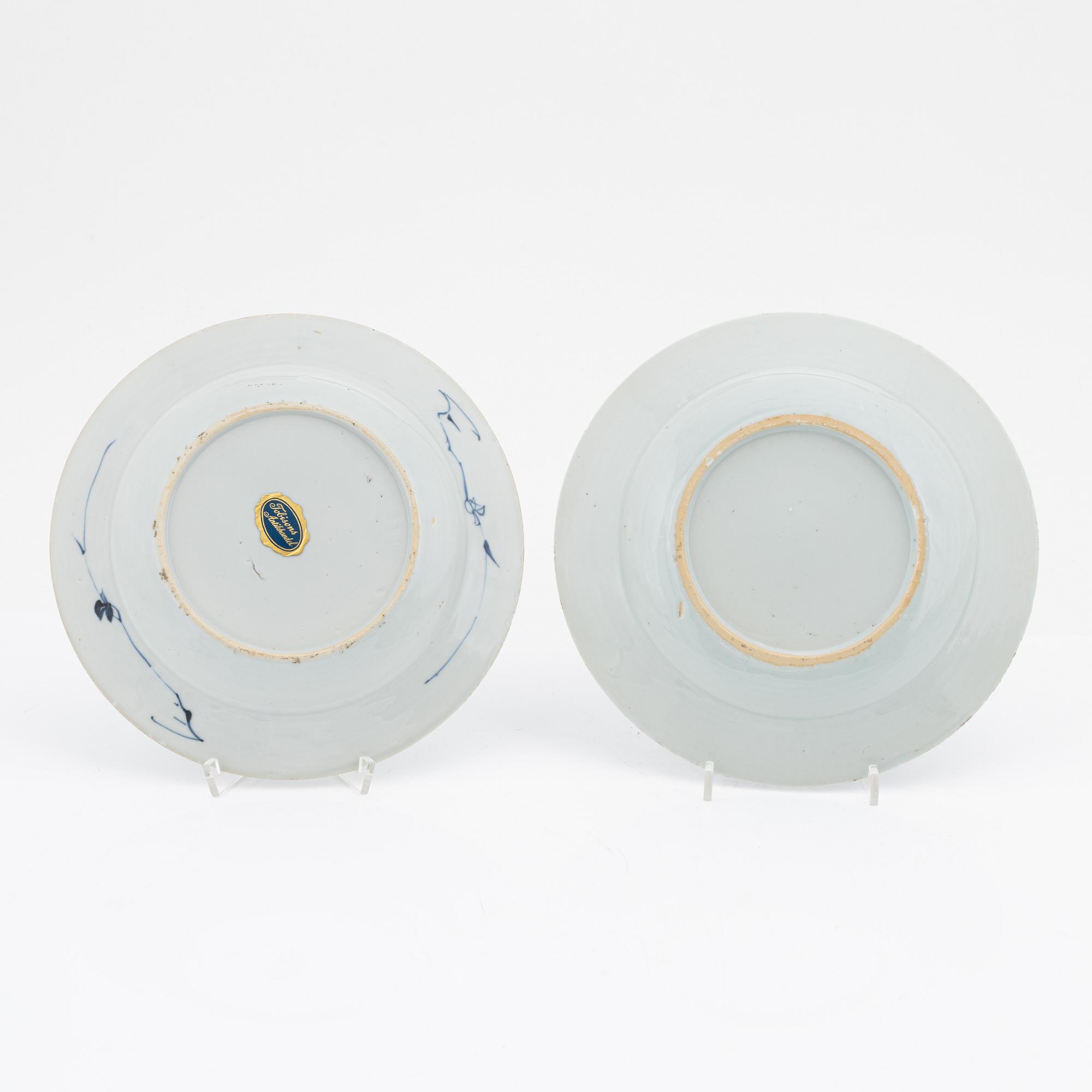 A blue and white serving dish and eight odd plates, Qing dynasty, 18th Century.