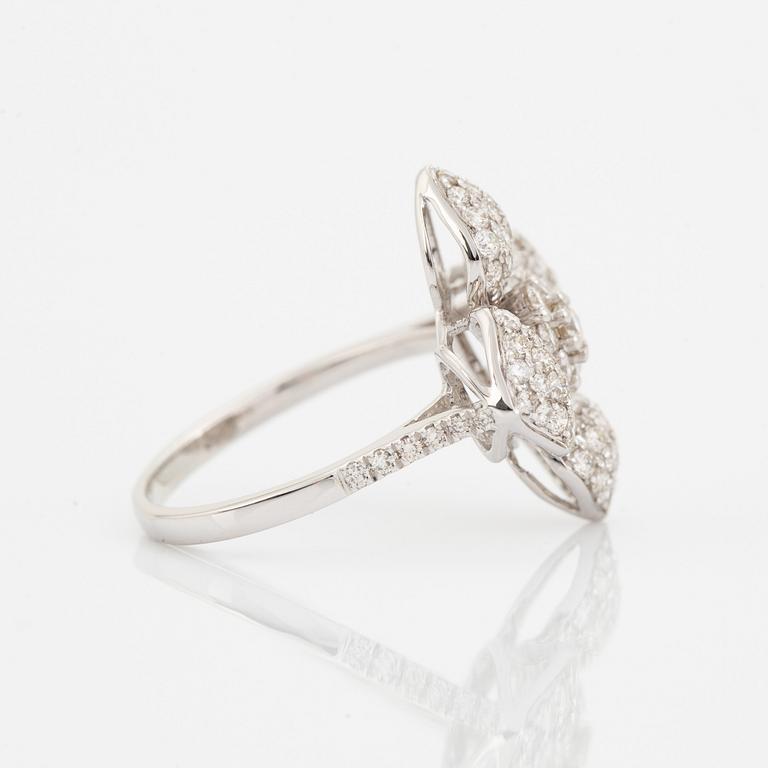 Brilliant cut diamond flower ring.