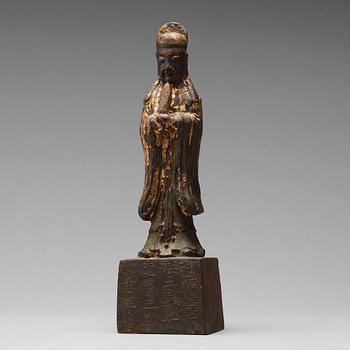 464. A copper alloy figure of a daoist dignitary, late Ming dynasty (1368-1644).