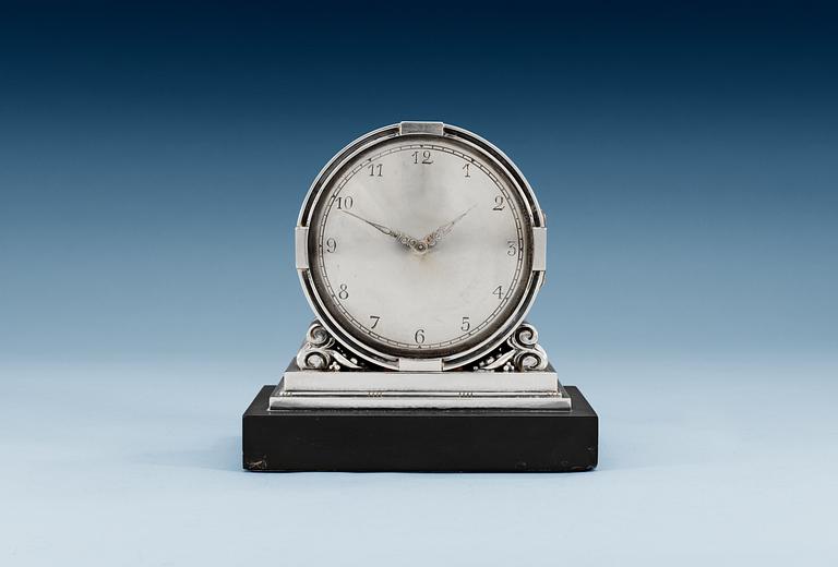 A Georg Jensen sterling mantle clock, designed by Johan Rohde, nr 596, maker's mark 1925-32.