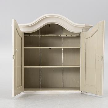 A Swedish rococo hanging cabinet, mid 18th century.