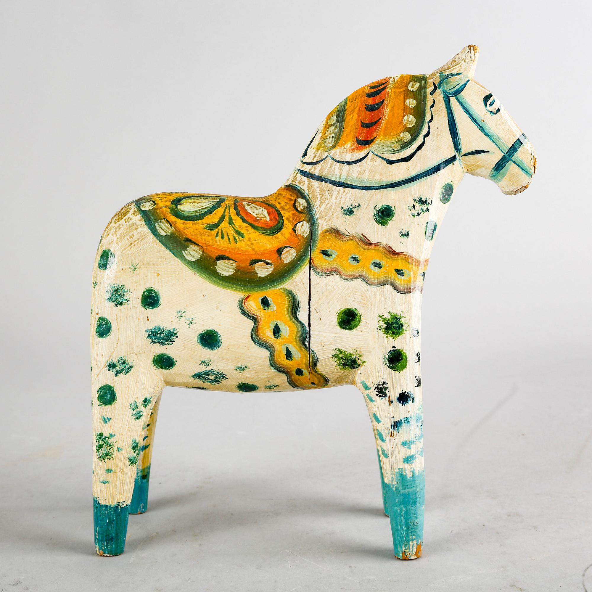 An early 20th century wooden horse, "Dalahäst".